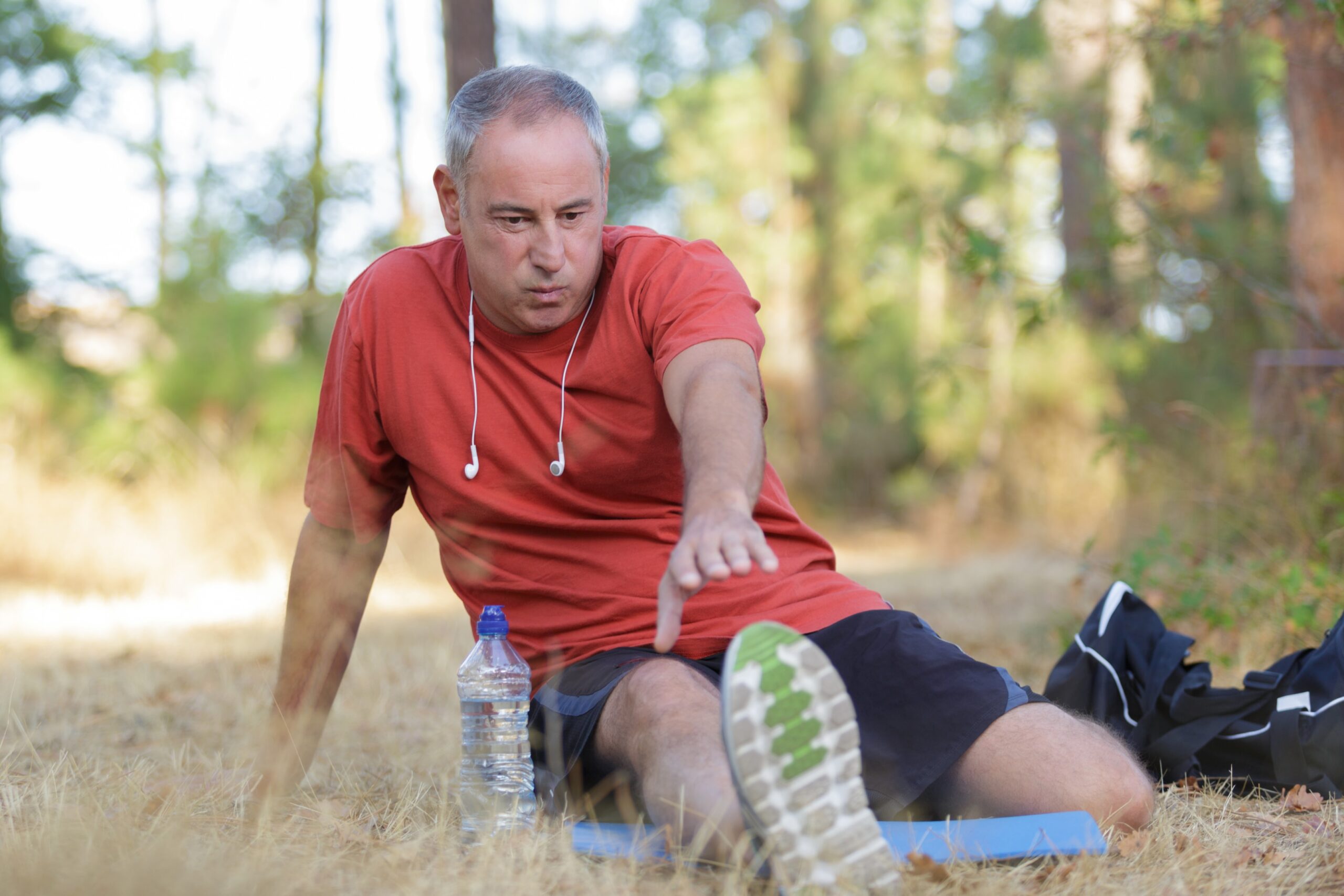 Walk your hands alongside your left leg until you feel the stretch in the back of your left thigh. 